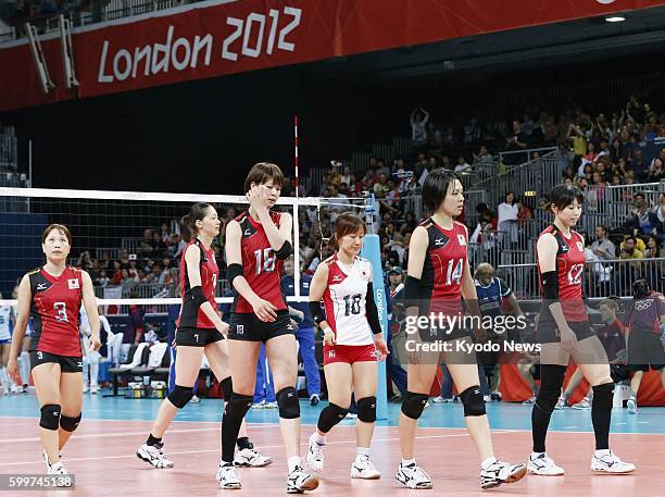 Britain - Players of the Japanese team Yoshie Takeshita, Kaori Inoue, Saori Kimura, Yuko Sano, Saori Sakoda and Risa Shinnabe leave the court after...