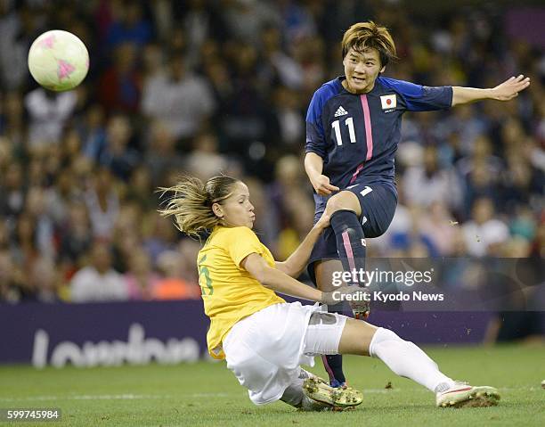 Wales - Japan's Shinobu Ono scores the team's second goal during the second half of a women's soccer quarterfinal match against Brazil at Millennium...