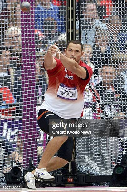 Britain - Japan's world champion Koji Murofushi makes his first attempt in a Group A men's hammer throw qualification round at the 2012 London...