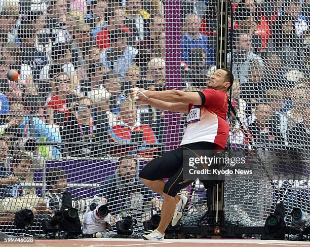 Britain - Japan's world champion Koji Murofushi makes his first attempt in a Group A men's hammer throw qualification round at the 2012 London...