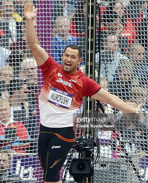 Britain - Japan's world champion Koji Murofushi shouts after his first attempt in a Group A men's hammer throw qualification round at the 2012 London...