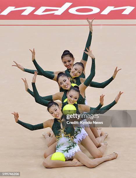 Britain - Japan's Rie Matsubara, Natsuki Fukase, Kotono Tanaka, Airi Hatakeyama and Nina Saeedyokota perform with the ball during the first day of a...