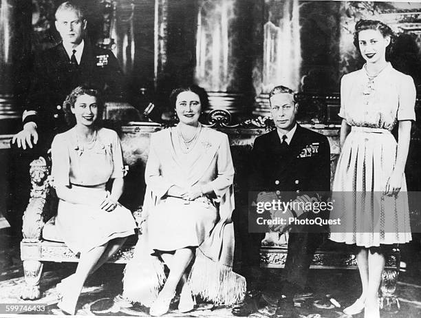 The Royal Family of Britain, including Princess Elizabeth's fiance Lt Philip Mountbatten, London, England, November 15, 1947. Left to right: Lt...