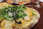 Stonebaked vegetarian pizza with rocket and mozzarella