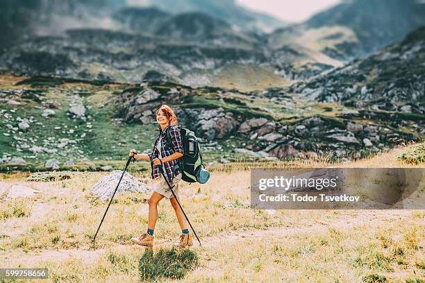 female hiker - hiking pole stock pictures, royalty-free photos & images