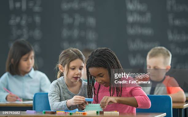 learning math with blocks - 5-10 2016 stock pictures, royalty-free photos & images