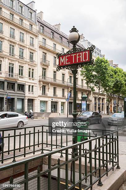 entrance to the underground metro in paris - subway paris stock-fotos und bilder