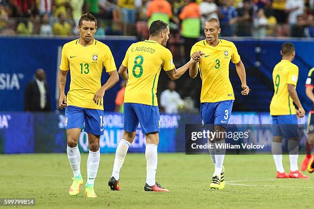 Miranda of Brazil celebrates with teammate Renato Augusto after scoring during a match between Brazil and Colombia as part of FIFA 2018 World Cup...