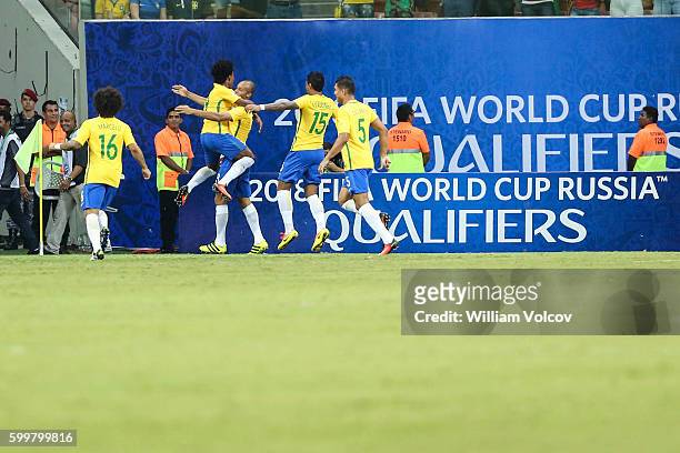 Miranda of Brazil celebrates with teammates after scoring during a match between Brazil and Colombia as part of FIFA 2018 World Cup Qualifiers at...
