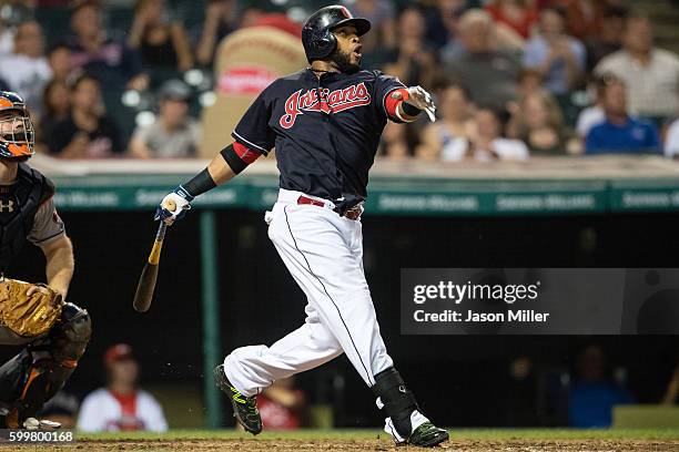 Carlos Santana of the Cleveland Indians hits a solo home run during the eighth inning against the Houston Astros at Progressive Field on September 6,...