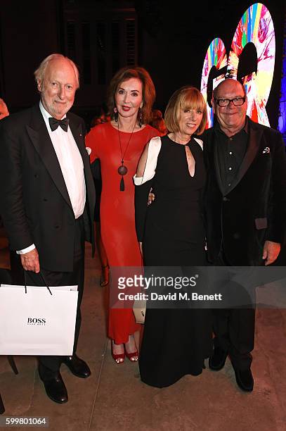 Ed Victor, Carol Victor, Kathy McGuinness and Paul McGuinness attend the GQ Men Of The Year Awards 2016 after party at the Tate Modern on September...