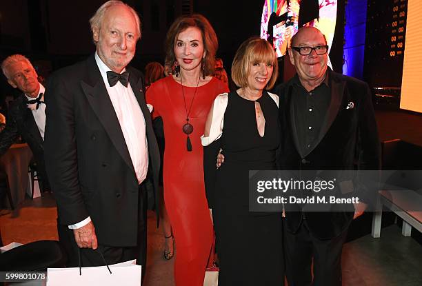 Ed Victor, Carol Victor, Kathy McGuinness and Paul McGuinness attend the GQ Men Of The Year Awards 2016 after party at the Tate Modern on September...