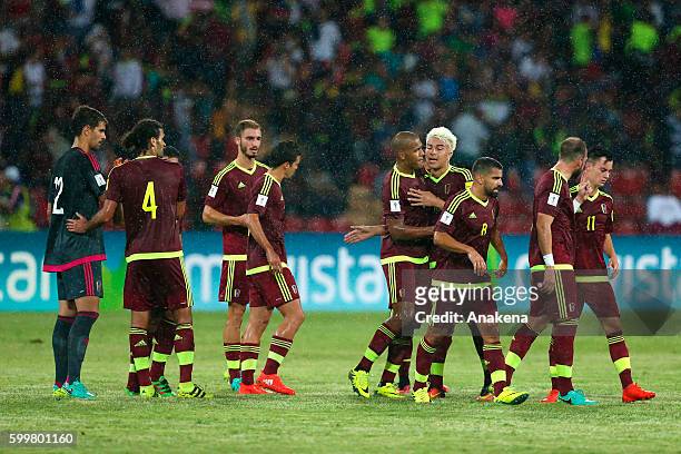Juan Pablo Anor celebrates with teammates after scoring the first goal of his team during a match between Venezuela and Argentina as part of FIFA...