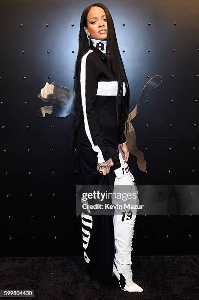 Rihanna celebrates the opening of the FENTY PUMA by Rihanna pop-up shops powered by SIX:02 on September 6, 2016 in New York City.