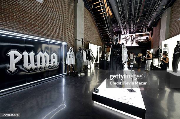 Rihanna celebrates the opening of the FENTY PUMA by Rihanna pop-up shops powered by SIX:02 on September 6, 2016 in New York City.