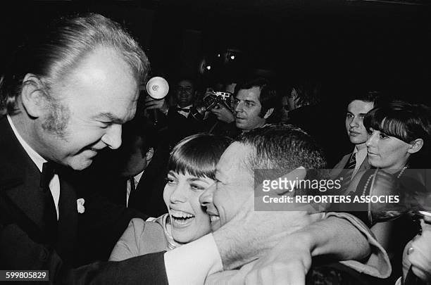 Singer Mireille Mathieu After Her Show At The Olympia Music Hall With Her Manager Johnny Stark And Singer Henri Salvador, In Paris, France, On...