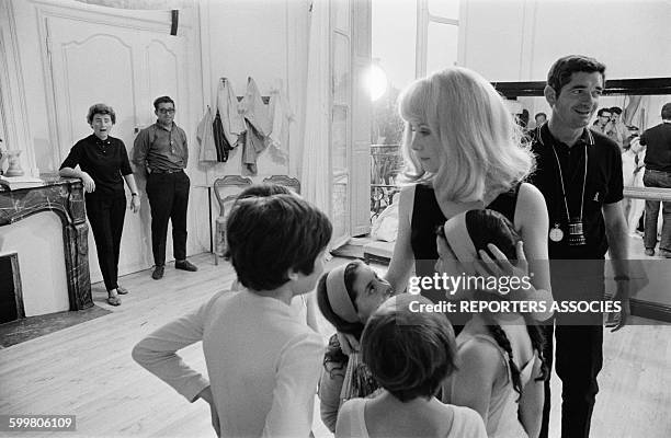Catherine Deneuve And Director Jacques Demy On The Set Of The Movie 'Les Demoiselles De Rochefort', In Rochefort, France, On June 9, 1966 .