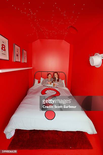 McDonalds super-fans Laura Paton and Emma Kendrick relax in McDonalds Monopoly Hotel at Federation Square on September 7, 2016 in Melbourne,...
