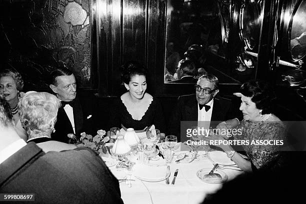 Musician Georges Auric With Maria Callas And Aristote Onassis At Maxim's Restaurant, in Paris, France, in May 1964 .