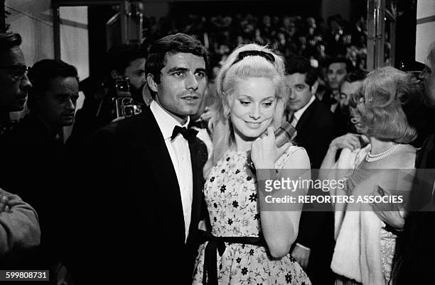 Actors Nino Castelnuovo And Catherine Deneuve After the Presentation Of the Movie 'Les Parapluies de Cherbourg' In Competition At the Cannes Film...