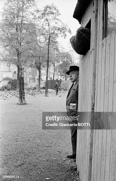 French poet Jacques Prévert walking down the streets of Paris, France, circa 1960 .
