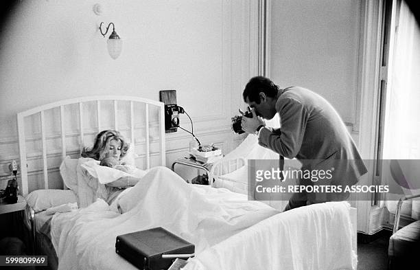 Actress Catherine Deneuve with Her Newborn Child Christian Vadim and his Father Director Roger Vadim at the Clinic, in Paris, France, in June 1963 .