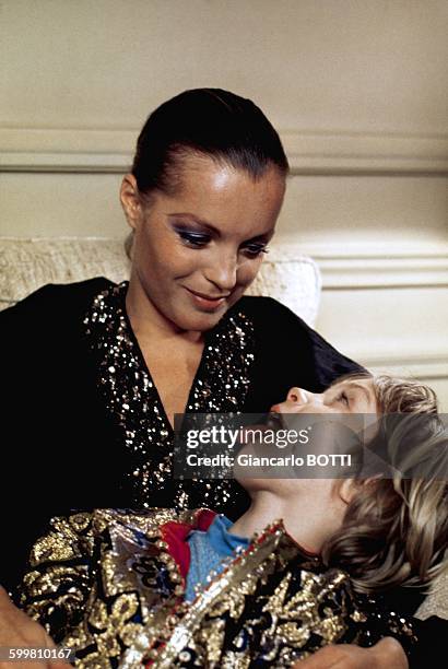 Austrian born actress Romy Schneider with her son David Meyen at home in France, in 1974 .