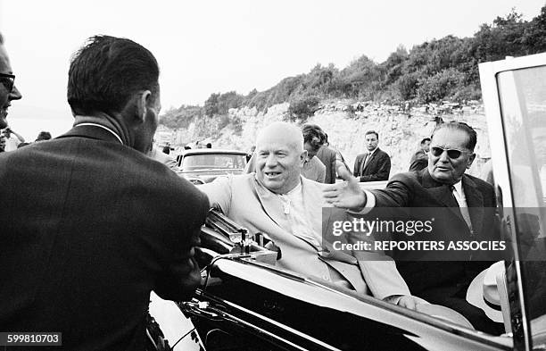 Nikita Khrushchev and Josip Broz Tito in A Convertible During Khrushchev's Visit in Yugoslavia, on August 25, 1963 .