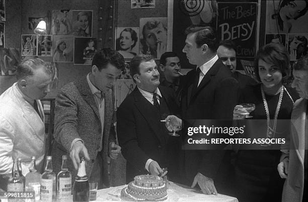 Actor Pierre Mondy's birthday at the Théâtre de la Renaissance with actors Philippe Nicaud, Yves Montand and Pascale Roberts, in Paris, France, in...