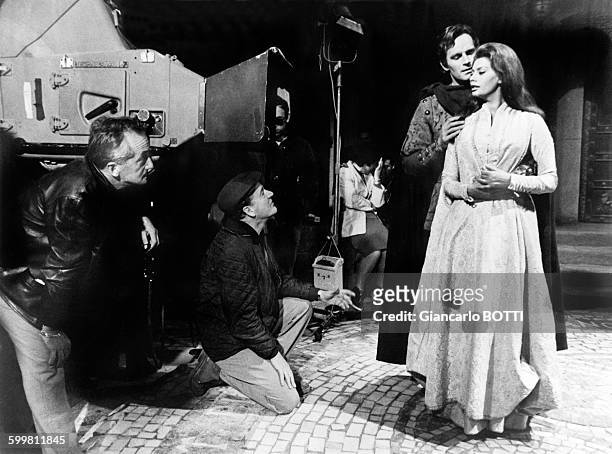 Italian actress Sophia Loren with American actor Charlton Heston on the set of the historical epic film 'El Cid' , directed by Anthony Mann in Spain,...