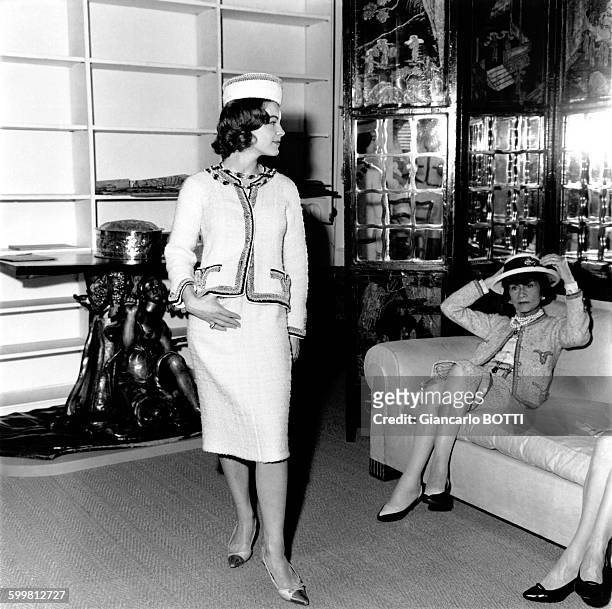 Austrian born actress Romy Schneider with legendary French fashion designer Coco Chanel at her apartment rue Cambon in 1960 in Paris, France .