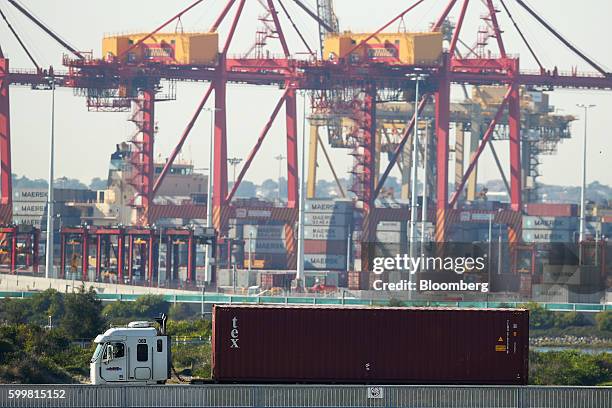 Truck transporting a shipping container leaves the Port Botany container terminal in Sydney, Australia, on Tuesday, Sept. 6, 2016. Australia's annual...