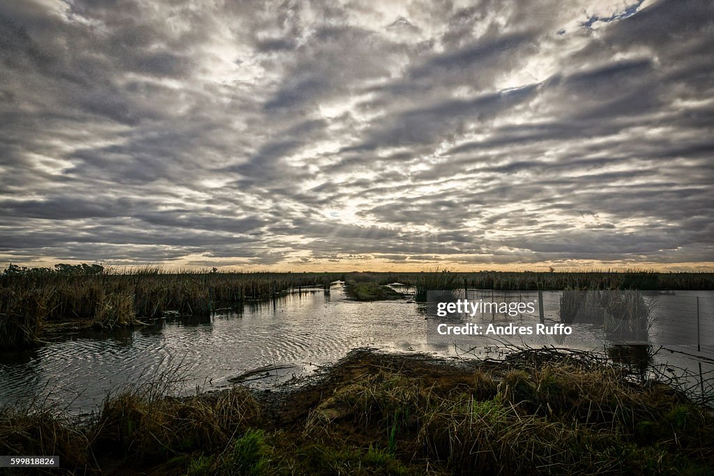 General view of a lagoon with a dramatic cloudy sky