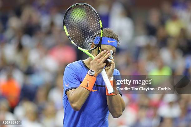 Open - Day 7 Rafael Nadal of Spain reacts after missing a shot at the net at 6-6 in the fifth set tie break during his loss against Lucas Pouille of...