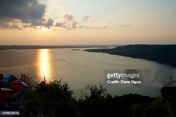 sunset lake travis - austin texas sunset stock pictures, royalty-free photos & images