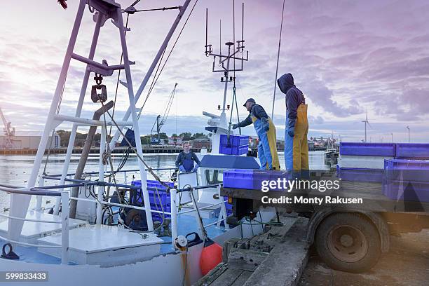 Unloading Fish Unloading Fish Photos and Premium High Res Pictures - Getty Images