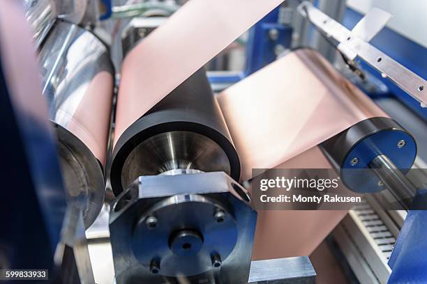 manufacturing lithium ion batteries in battery research facility - lithium ion battery stock pictures, royalty-free photos & images