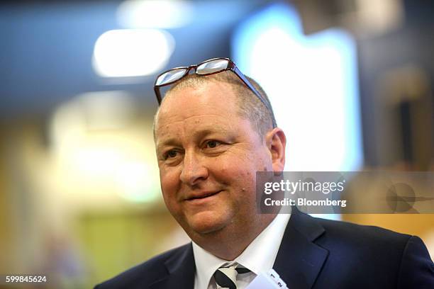 Mike Ashley, billionaire and founder of Sports Direct International Plc, poses for a photograph prior to the company's annual general meeting at...