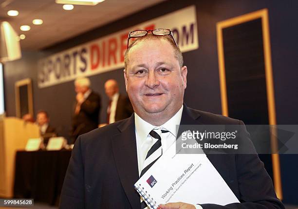 Mike Ashley, billionaire and founder of Sports Direct International Plc, poses for a photograph prior to the company's annual general meeting at...