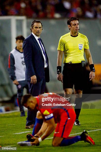 Juan Antonio Pizzi, coach of Chile looks at his player Alexis Sanchez during a match between Chile and Bolivia as part of FIFA 2018 World Cup...