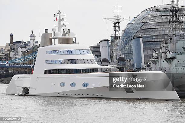 Russian billionaire Andrey Melnichenko's £225m Philippe Starck-designed boat is seen moored next to HMS Belfast on the River Thames on September 7,...