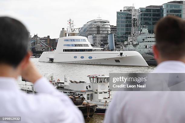 Russian billionaire Andrey Melnichenko's £225m Philippe Starck-designed boat is seen moored next to HMS Belfast on the River Thames on September 7,...