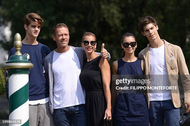 Italian actor Rocco Siffedri and his wife Rosa Caracciolo leave the Excelsior Hotel with Leonardo Tano , Laura Medcalf and Lorenzo Tano during at the...