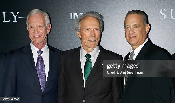 Retired airline captain Chesley "Sully" Sullenberger, director Clint Eastwood and actor Tom Hanks attend the "Sully" New York premiere at Alice Tully...