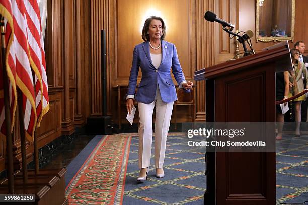 House Minority Leader Nancy Pelosi arrives for a news conference to call on Republicans to fund programs to combat the spread of the Zika virus at...