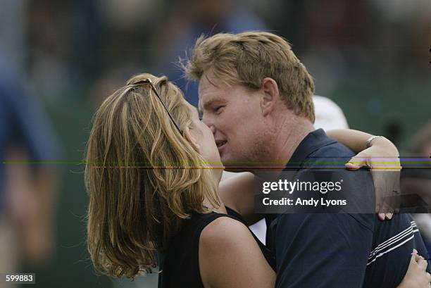 Ernie Els of South Africa hugs his wife Leizl after winning the Genuity Championship at Doral Golf Resort and Spa in Miami, Florida. DIGITAL IMAGE....