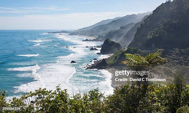 view over rugged coastline, punakaiki, paparoa np - david cliff stock pictures, royalty-free photos & images