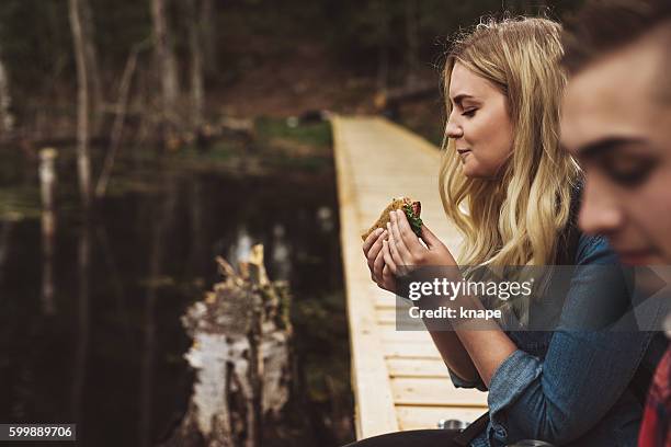 young friends out on a hike in nature - broken footpath stock pictures, royalty-free photos & images