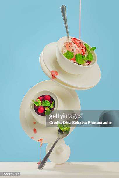ice cream with syrup, berries and mint leaves - syrup drizzle stock pictures, royalty-free photos & images