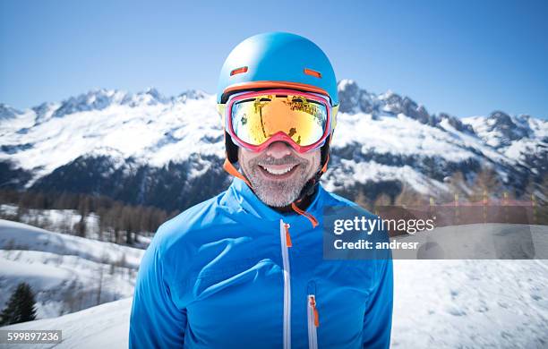 happy adult man skiing - ski goggles stock pictures, royalty-free photos & images